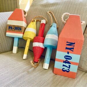 Decorative, distressed buoys - perfect for a beach house or coastal themed room